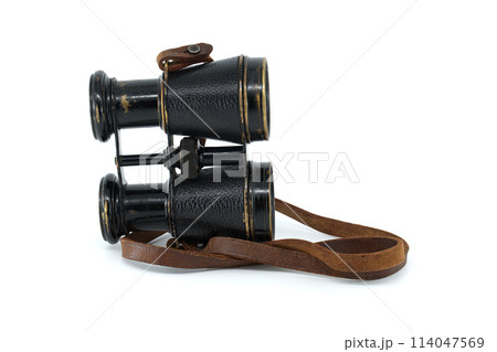 Binoculars with brown leather straps isolated on white 114047569