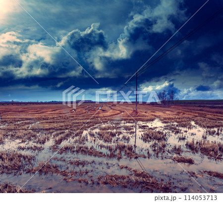Landscape crop fields flooded by the storm. 114053713