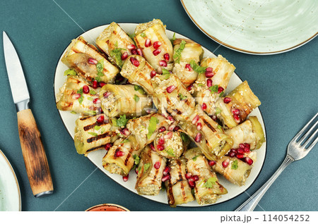 Badrijani, baked eggplant rolls. 114054252