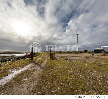 A Wind turbine is generating in Burtonport harbour, Countz Donegal, Ireland A Wind turbine is generating in Burtonport harbour, Countz Donegal, Ireland 114055734