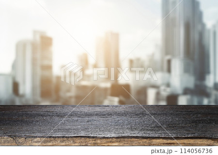 Wooden Table Top With Blurred City Background 114056736