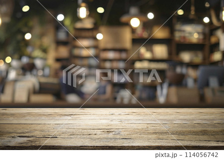 Empty wooden table for present product on coffee shop blur background. 114056742
