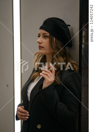 Beautiful lonely girl in black posing in the subway. Beautiful lonely girl in black posing in the subway. 114057242