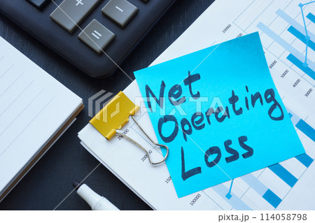 Business report and sticker with words Net operating loss. Business report and sticker with words Net operating loss. 114058798