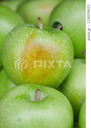 stack of Rotten apple in a bowl stack of Rotten apple in a bowl 114059021