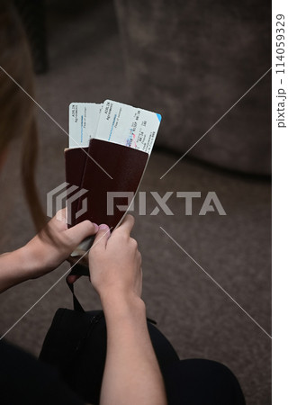 Closing a person with passports and boarding pass at the airport 114059329