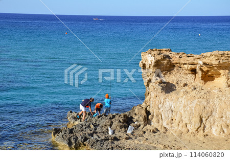 Little boys enjoy fishing with their mom. Weekend hobbies. Mothers Day 114060820