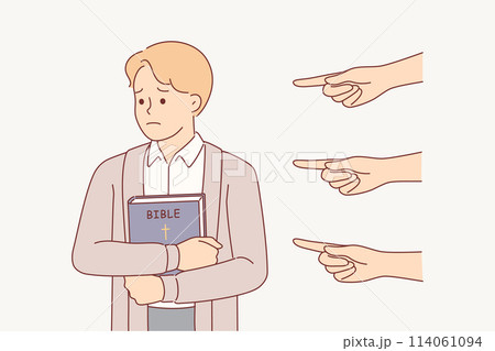 Sad christian man with bible, feeling persecution and oppression, from people pointing fingers 114061094