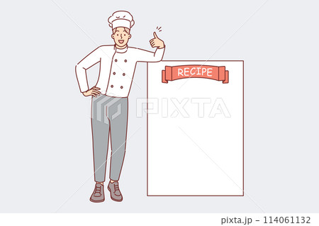 Man restaurant chef stands near blank recipe sheet and shows thumbs up as sign of approval of menu 114061132