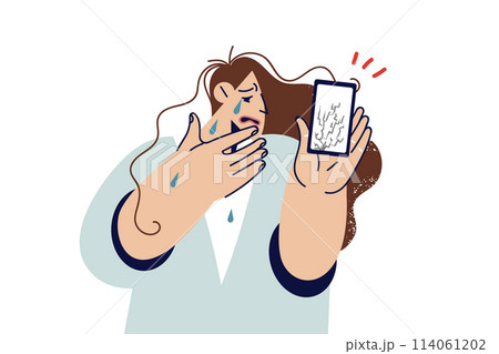 Crying woman demonstrates phone with broken display or protective film after gadget fell to ground 114061202