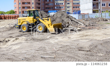 excavator is working and digging at construction site 114061238