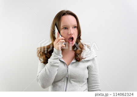 woman with mobile phone, over white background 114062324