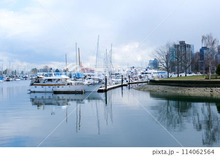 4k Beautiful harbour, port, marina, haven, sailing boats, yachts, blue water, lake, bay, trees, park, house, docks, calm, sunny day 4k Beautiful harbour, port, marina, haven, sailing boats, yachts, blue water, lake, bay, trees, park, house, docks, calm, sunny day 114062564