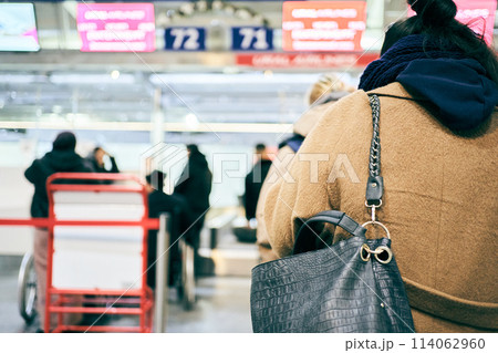 A group of people queuing at the boarding gate.With space to copy. High quality photo A group of people queuing at the boarding gate.With space to copy. High quality photo 114062960