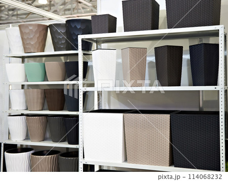 Waste baskets on counter in store 114068232