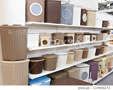 Waste baskets on counter in store 114068272