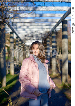 Winter Fun in Bitigheim-Bissingen: Beautiful Girl in Pink Jacket Amidst Half-Timbered Charm. a lovely girl in a pink winter jacket standing in the archway of the historic town of Bitigheim-Bissingen Winter Fun in Bitigheim-Bissingen: Beautiful Girl in Pink Jacket Amidst Half-Timbered Charm. a lovely girl in a pink winter jacket standing in the archway of the historic town of Bitigheim-Bissingen 114071038