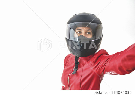 Beautiful empowered motorcyclist woman with modern look. Power woman concept Beautiful empowered motorcyclist woman with modern look. Power woman concept 114074030