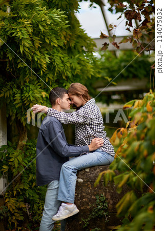 Young Cute Female Hugs Boyfriend. In Autumn Outdoor. Lovers Walking in Park. Attractive Funny Couple. Lovestory in Forest. Man and Woman. Cute Lovers in the Park. Family Concept. Happy Couple. Young Cute Female Hugs Boyfriend. In Autumn Outdoor. Lovers Walking in Park. Attractive Funny Couple. Lovestory in Forest. Man and Woman. Cute Lovers in the Park. Family Concept. Happy Couple. 114075032