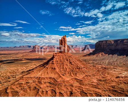Massive Rock Formation Dominating Desert Landscape Massive Rock Formation Dominating Desert Landscape 114076856