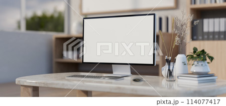 A computer white-screen mockup on a luxury marble table in a modern office or home office. 114077417