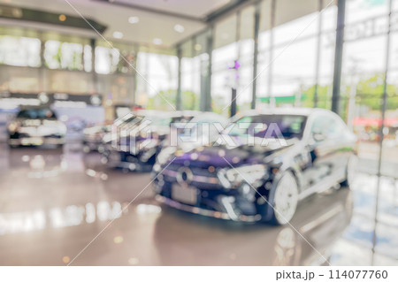 new cars in showroom interior blurred abstract background 114077760