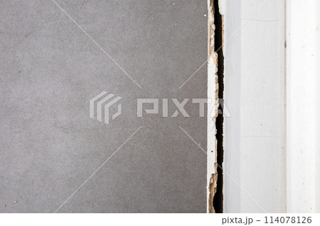 cracked concrete floor of the house 114078126
