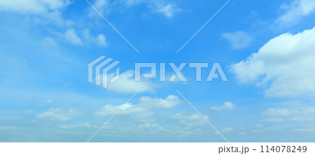 beautiful blue sky with clouds background 114078249
