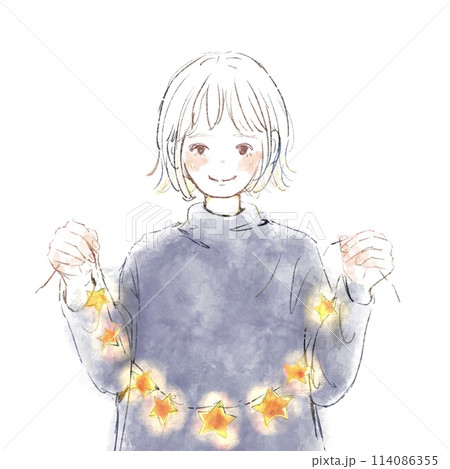 輝く星のリースを持った笑顔の女性 114086355