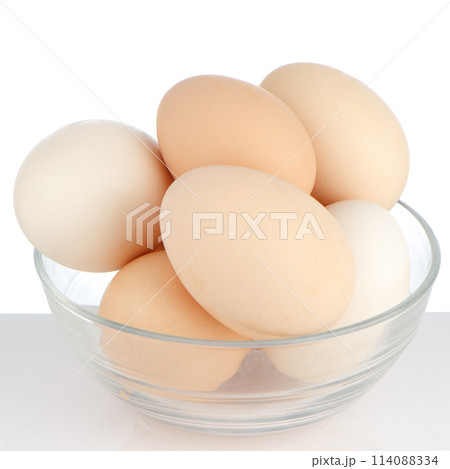 Brown eggs in transparent bowl 114088334