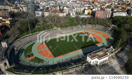 Aerial View of a Historic Stadium With Track and Field Amidst Urban Landscape at Dusk. Milan, Italy 114090230