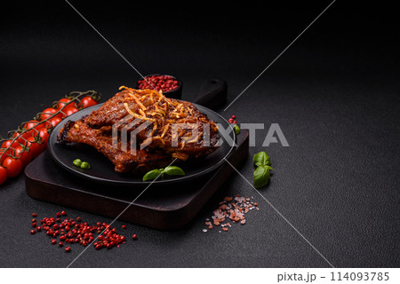 Delicious pork or beef ribs baked on the grill with salt, spices and herbs 114093785