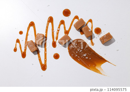 Cubes of salted caramel on a white background Cubes of salted caramel on a white background 114095575