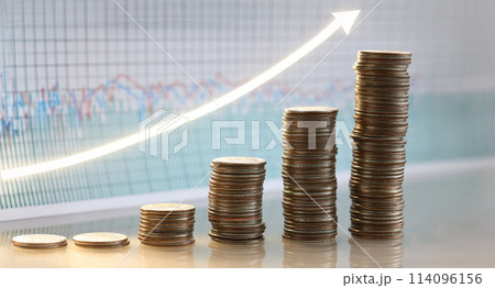 Stack of silver coins presentation at table going up 114096156