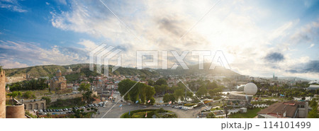 Landscape panorama of historical Tbilisi street with mountains and blue cloudy sunny sky 114101499