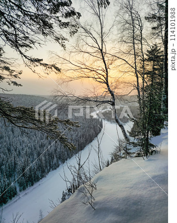 evening light of the setting sun in a frosty haze evening light of the setting sun in a frosty haze 114101988