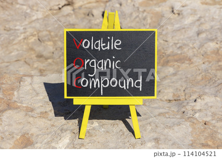 VOC volatile organic compound symbol. Concept words VOC volatile organic compound on beautiful yellow blackboard. Beautiful stone background. Business VOC volatile organic compound concept. Copy space VOC volatile organic compound symbol. Concept words VOC volatile organic compound on beautiful yellow blackboard. Beautiful stone background. Business VOC volatile organic compound concept. Copy space 114104521