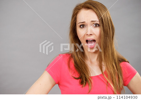 Shocked and surprised woman Shocked and surprised woman 114104930