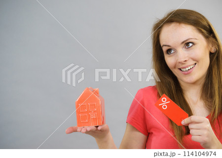 Woman buying house in low price. Woman buying house in low price. 114104974
