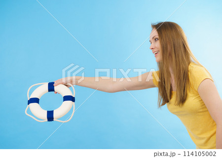Girl holds life buoy rescue ring Girl holds life buoy rescue ring 114105002