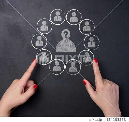 Personnel recruitment concept, search for talented employees. Chalk drawn worker icons on black chalk board Personnel recruitment concept, search for talented employees. Chalk drawn worker icons on black chalk board 114105358