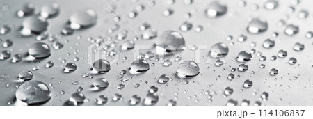Fresh water drops on white glass, panoramic banner with rain droplets for background. Concept of wet, texture, splash, surface, dew Fresh water drops on white glass, panoramic banner with rain droplets for background. Concept of wet, texture, splash, surface, dew 114106837