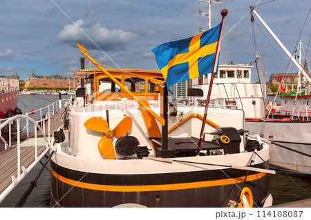 Swedish Flag Over boat in Stockholm, Sweden 114108087
