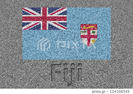 石板の上に描かれたフィジーの国旗と、掘ったような「Fiji」の文字 114108545