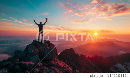 A man is standing on a mountain top, holding a trophy A man is standing on a mountain top, holding a trophy 114110111
