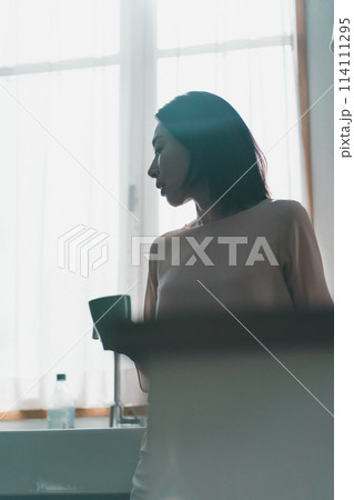a forty-something woman a forty-something woman 114111295