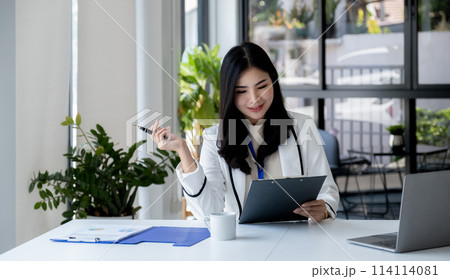 Businesswomen bookkeeper hand holding pen and use calculator, laptop analysis the graph for Setting challenging business goals and ready to achieve target at home office Businesswomen bookkeeper hand holding pen and use calculator, laptop analysis the graph for Setting challenging business goals and ready to achieve target at home office 114114081