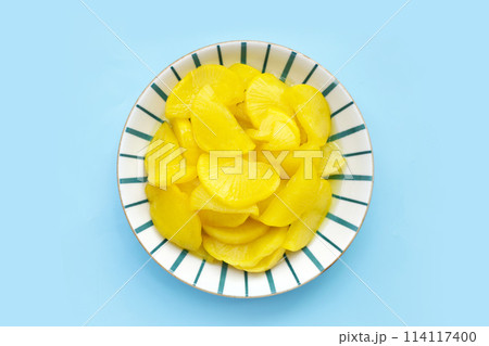 Sweet and tart slices of yellow pickled daikon, known as takuan in Japan and danmuji in Korea. 114117400