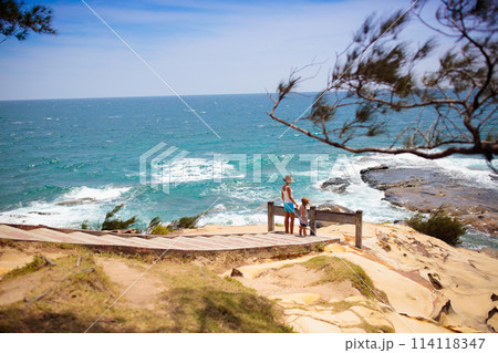 Family hiking. Mountain sea view. Travel with kids Family hiking. Mountain sea view. Travel with kids 114118347