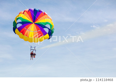 Kids parasailing. Water sport on summer vacation. Kids parasailing. Water sport on summer vacation. 114118468